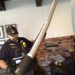 Fitting a piece of liner chimney liner victoria BC